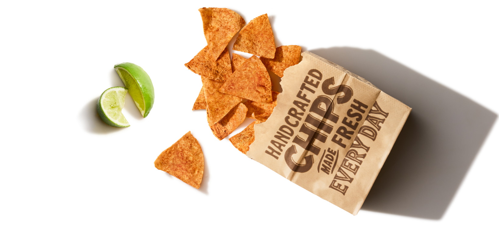 A classic brown Chipotle bag of new Chili Lime Chips.