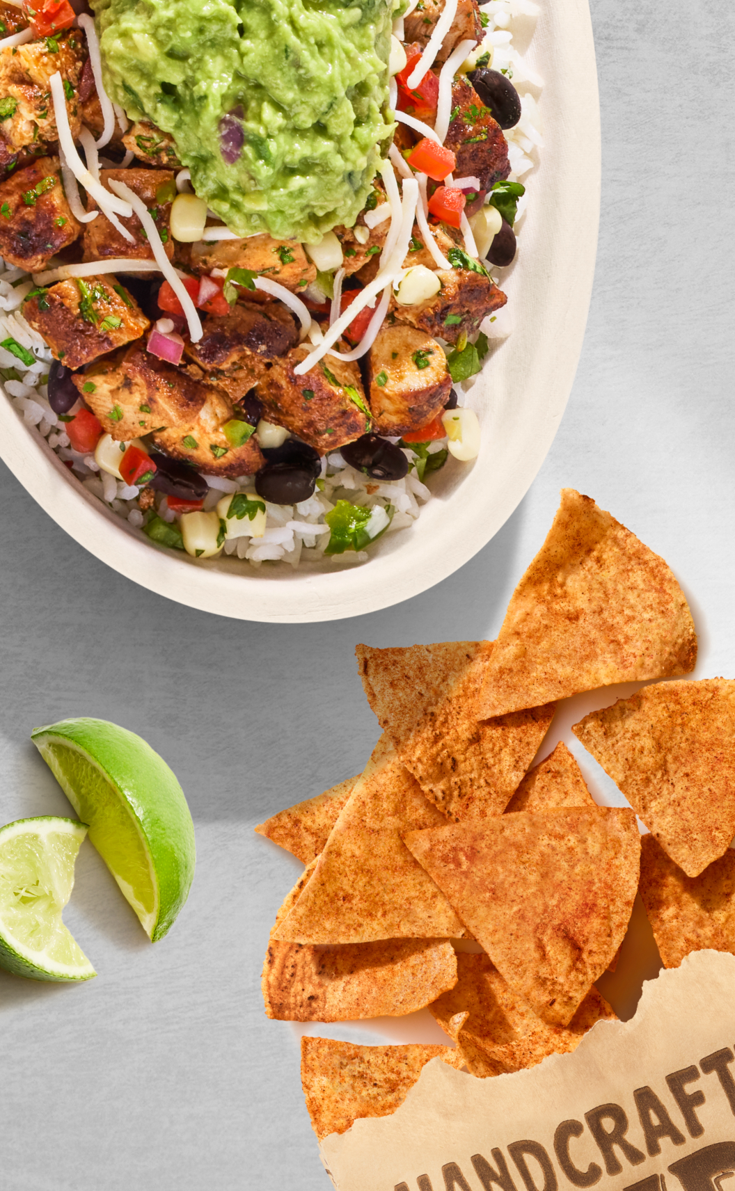 pollo asado chicken bowl with Chipotle chili lime chips